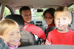 parent with child in car