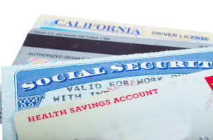 Social security and driver license cards isolated on white.