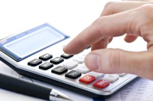 stockfresh_121705_tax-calculator-and-pen_sizeS-300x199