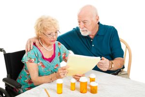 stockfresh_1532919_senior-couple-medical-bills_sizeS-300x200