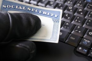 stockfresh_862586_identity-theft-and-social-security-card_sizeS-300x200